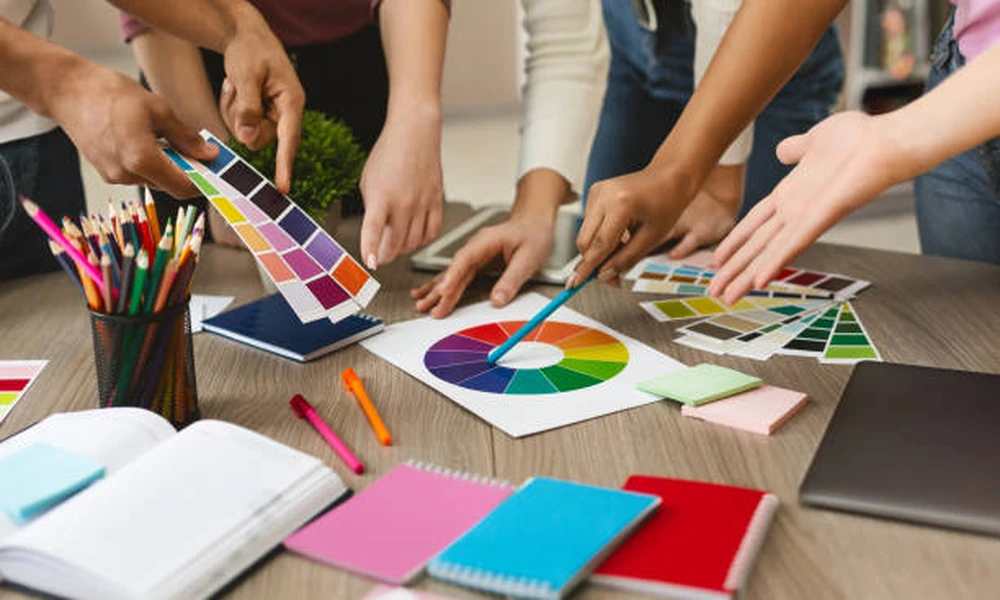 When are payment schedules discussed with global UX agencies?